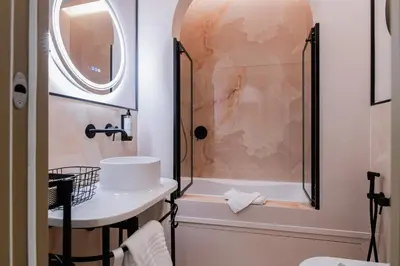 a bathroom with a shower and a sink at 163 BOUTIQUE HOTEL in Rome