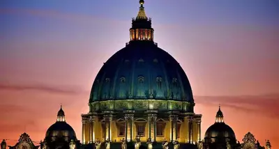 a large building with a dome on top of it at Casa de mi Zia in Rome