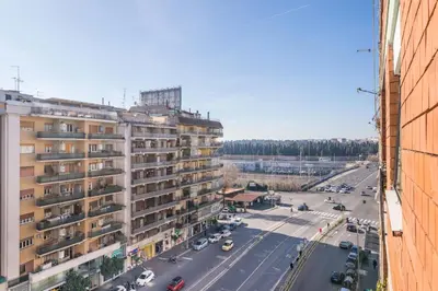 a view of a city street with a building at Maison Lumiere, Design Apt 5 min from Tiburtina Station in Rome
