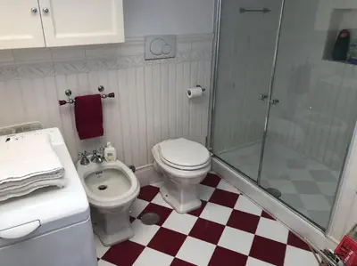 a bathroom with a toilet and a shower at Walking distance from Via Veneto in Rome