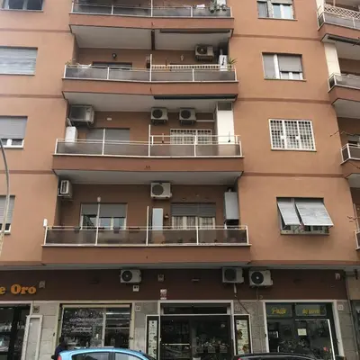 an apartment building with balconies on the side of it at Perla Vaticana in Rome
