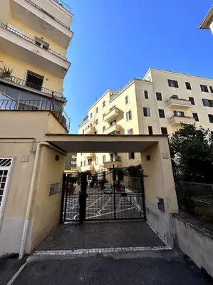 an entrance to a building with a gate in front at Trastevere Monteverde Velia House in Rome