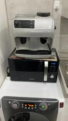 a coffee maker sitting on top of a counter at Domus Felix Rome in Rome
