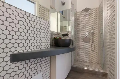 a bathroom with a sink and a shower at Domus Rinascimento (Piazza Navona) in Rome