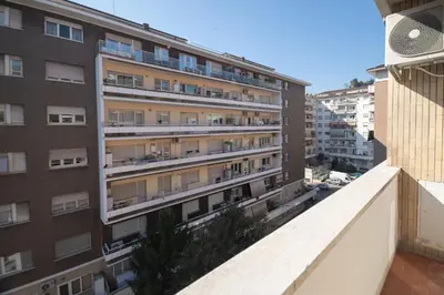 an apartment building viewed from the balcony of a building at Vatican City Apartment in Rome