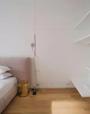 a living room with a couch and a table at Youroom Margutta in Rome