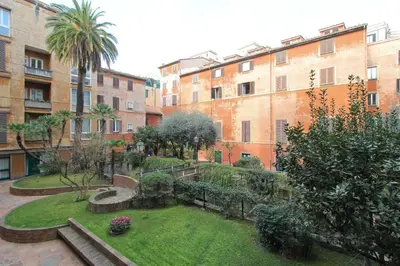 a garden in a courtyard in a building at Giove in Trevi in Rome