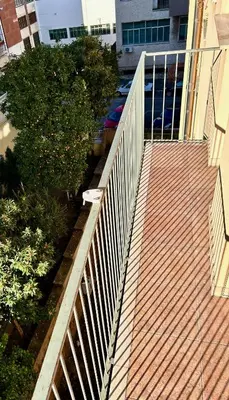 an overhead view of a wooden walkway next to a building at Urban Chic San Paolo Apartment Rome in Rome