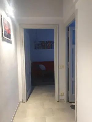 a hallway leading to a room with at House Cocò in Rome