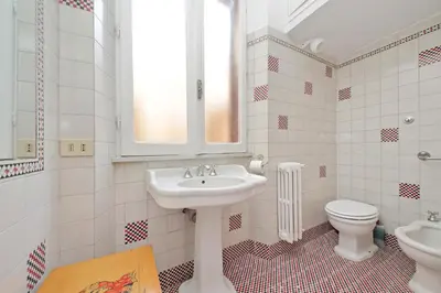 a bathroom with a sink and a toilet at Spagna in Rome