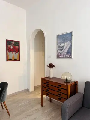 a living room with a couch and a table at La Casa di Testaccio Apartment in Rome
