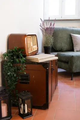 a living room with a table with a telephone on it at Orso 70 apartment in Rome