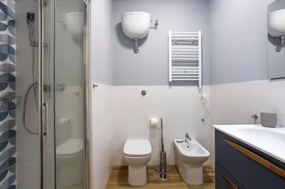 a bathroom with a shower and a toilet and a sink at BDC - Euphoria 2BDR at Vatican in Rome