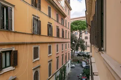 a view of an alley between two buildings at Borgo Plauto Oasi di Eleganza vicino al vaticano in Rome