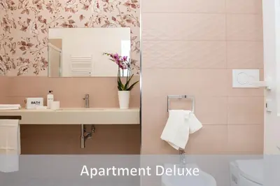 a bathroom with a sink and a mirror at Best Vatican Apartment in Rome
