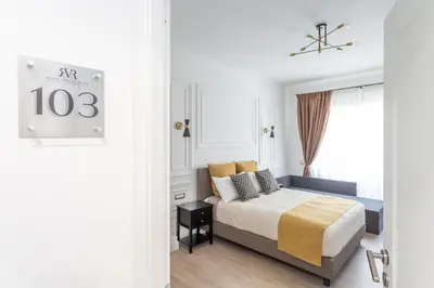 a bedroom with a bed and a window at Rhome Vatican Rooms in Rome