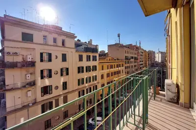 a balcony with a view of a city with buildings at Etruria At San Giovanni by Halldis in Rome