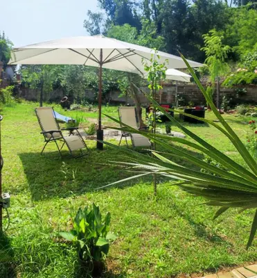 an outdoor patio with a table with food on it at Villa Alberici in Rome