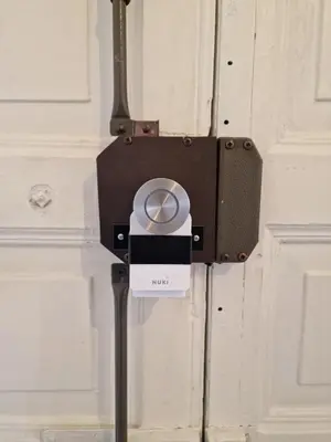 a door with a padlock attached to it at Delizioso appartamento al Pigneto in Rome