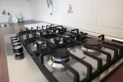 a stove top with a bunch of burners on it at Vatican Museum Scipioni BED & Breakfast in Rome