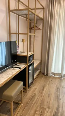 an office with a desk and a computer in a room at Romi Suite in Rome