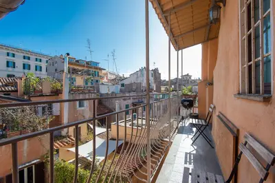 an apartment balcony with a view of a city at Panoramic Apartment Trastevere in Rome