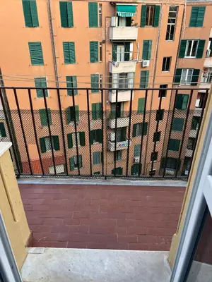 a view of an apartment building from a window at Luciano San Giovanni Guest House in Rome