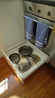 a stove in a kitchen with blue towels at Aroma Vaticano - Appartamento a San Pietro in Rome
