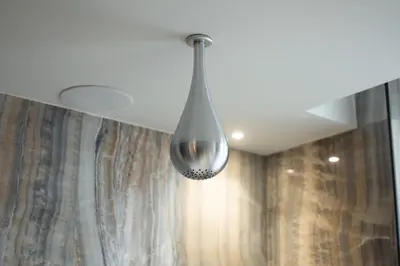 a ceiling light hanging from a ceiling at Tritone Luxury Suites Fontana di Trevi in Rome