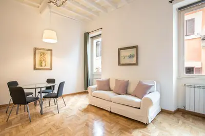 a living room with a couch and a table at Eri's Apartment in Rome