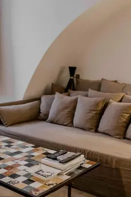 a living room with a couch with a coffee table at Piazza Navona Luxury Loft in Rome