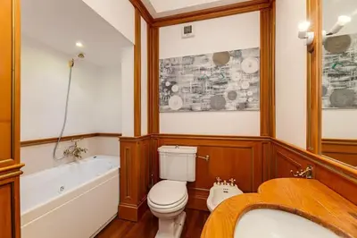 a bathroom with a toilet and a tub and a sink at Che Eleganza! Irresistibile dimora, Campo de Fiori in Rome