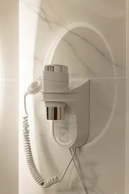 a security camera attached to a wall at Dolce casa al Vaticano in Rome