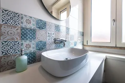 a bathroom with a white sink and a mirror at Time 4 Rome in Rome