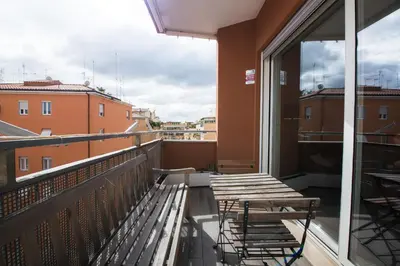 a balcony with benches and a view of buildings at Time 4 Rome in Rome