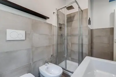 a bathroom with a shower and a toilet and a sink at BDC - The Perfect Mix in Rome