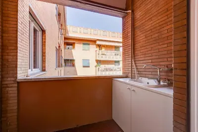 a bathroom with a sink and a large window at BDC - The Perfect Mix in Rome