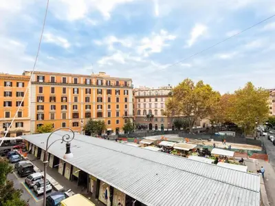 an overhead view of a building with a roof at Trastevere Luxury Bright Apartment in Rome