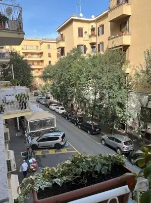 a view of a city street with cars and buildings at Dolce Vita Suites in Rome