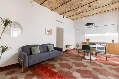 a living room with a couch and a table at Welcome to Vatican in Rome