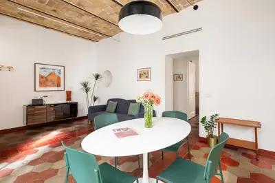 a living room with a white table and chairs at Welcome to Vatican in Rome