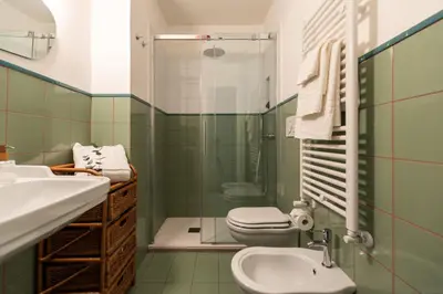 a bathroom with a toilet and a sink and a shower at Welcome to Vatican in Rome
