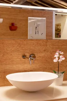 a white sink on a counter in a bathroom at Restart Accommodations Moro in Rome
