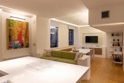 a living room with a couch and a table at Restart Accommodations Moro in Rome