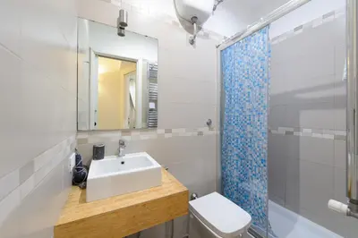 a bathroom with a sink and a toilet and a shower at Guesthouse o Affittacamere Casa Barberini in Rome