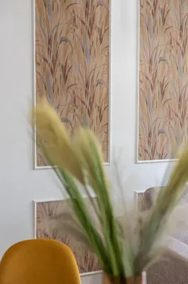 a yellow chair and a plant in a room at Cornelia cozy home in Rome