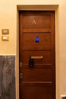 a door in a building with aaa on it at Pearl of Circo Massimo in Rome