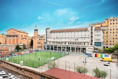 a tennis court in the middle of a city at Bright and cozy apartment near the Vatican city in Rome