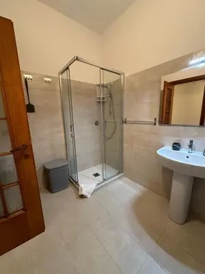 a bathroom with a shower and a sink at luna in trastevere apartamento in Rome