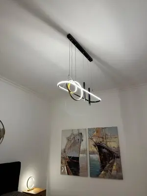 aendant light hanging from a ceiling in a room at luna in trastevere apartamento in Rome